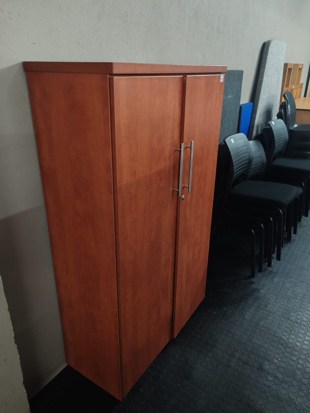 Second-hand cherry two-door cupboard