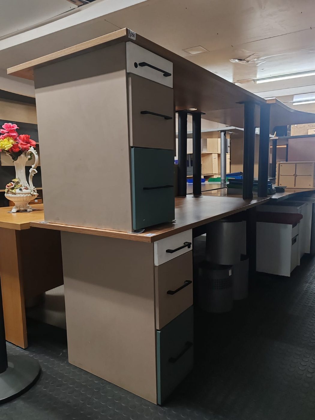 Second-hand desks with green and beige pedestals