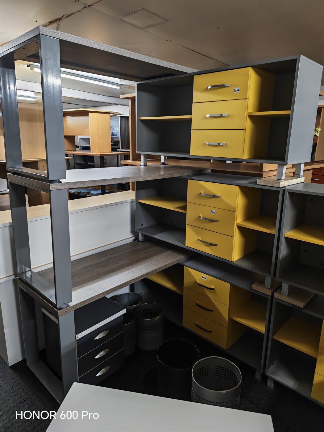 Second-hand grey and yellow modular workstations