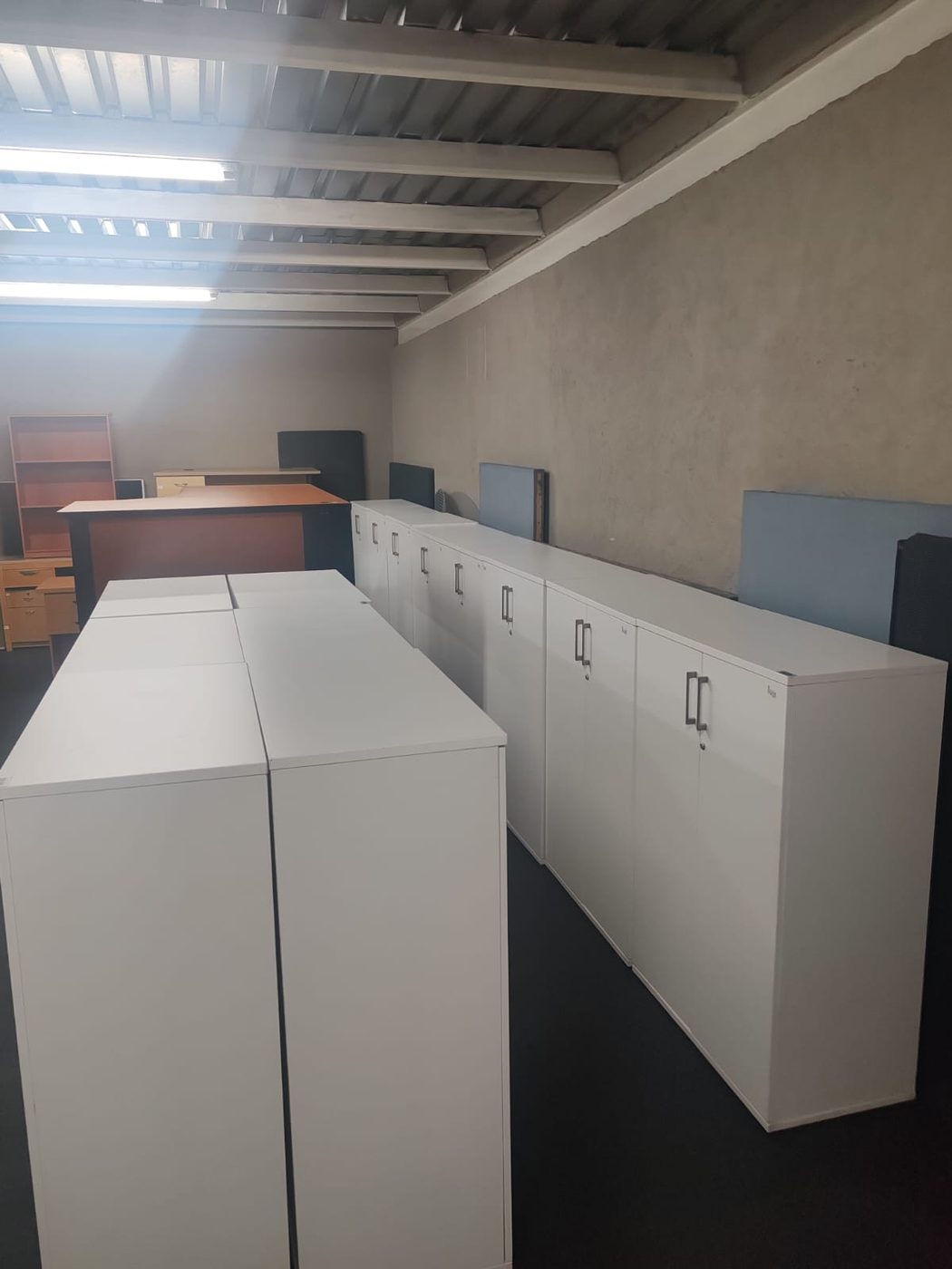 Second-hand white cupboards